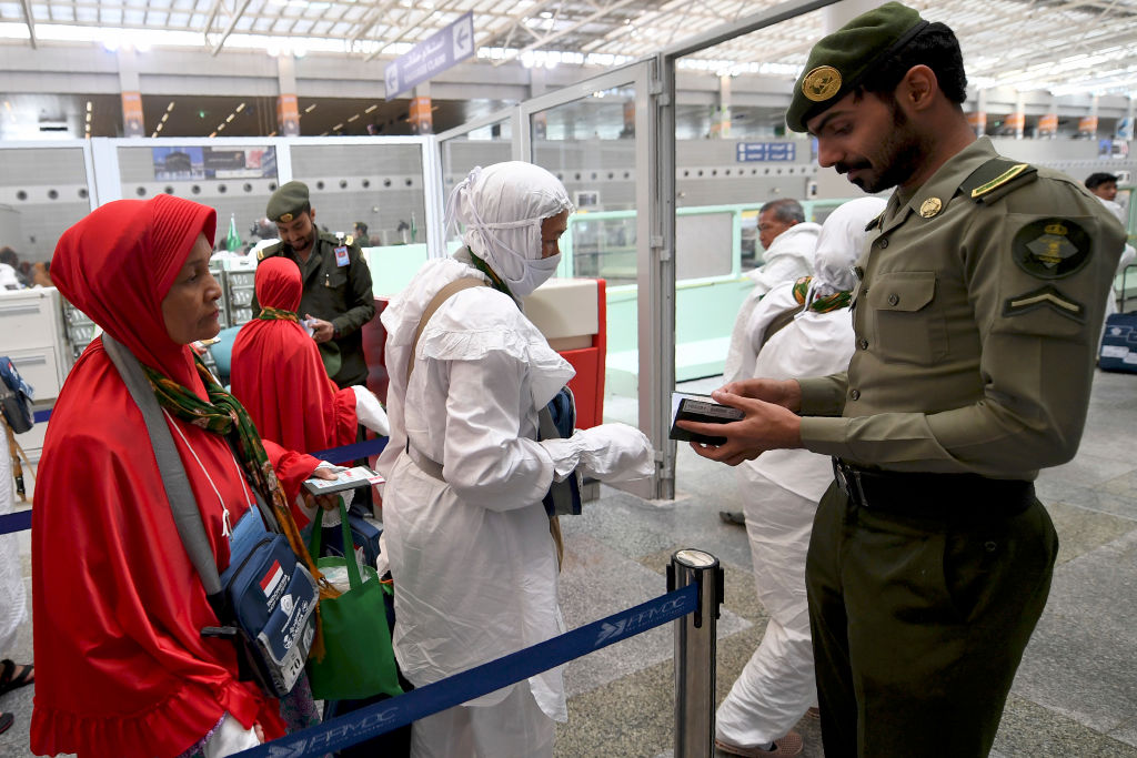 Muslim pilgrims arrive at Jeddah airport on August 14 2018 prior to the start of the annual Hajj pilgrimage in the holy city of Makkah, The hajj expected to draw more than two million pilgrims to Mecca this year represents a key rite of passage for Muslims and a massive logistical challenge for Saudi authorities with colossal crowds crammi