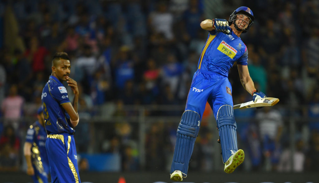 Mumbai Indians cricketer Hardik Pandya L looks on as Rajasthan Royals cricketer Jos Buttler jumps in air to celebrate after scoring the winning run during the 2018 Indian Premier League IPL Twenty20 cricket match Mumbai Indians vs Rajasthan Royals at the Wankhede Stadium in Mumbai 
Photo: INDRANIL MUKHERJEE/AFP/Getty Images.