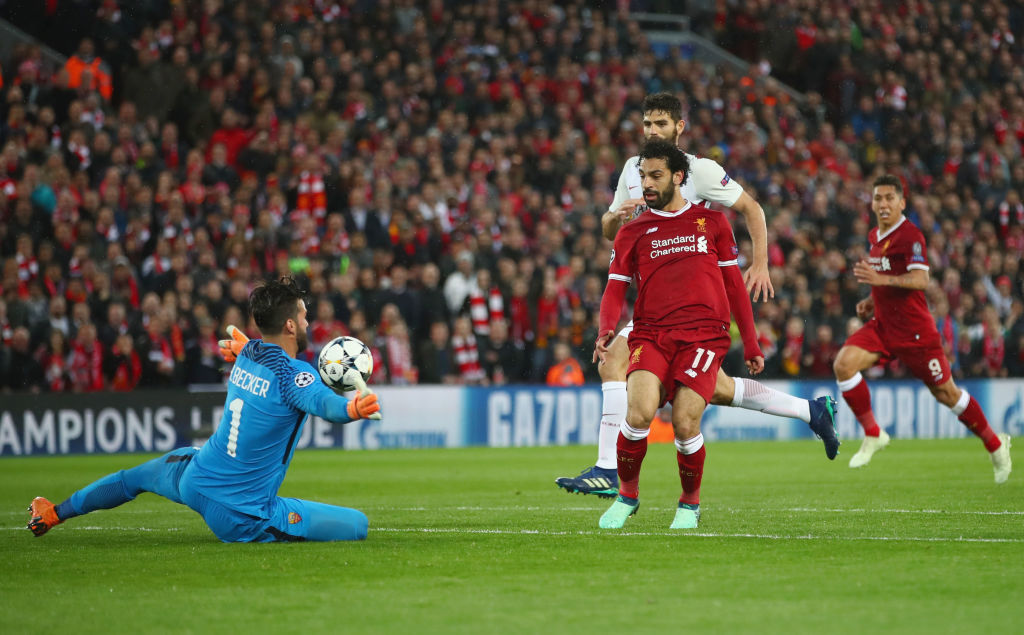 Mohammed Salah scores during the UEFA Champions League Semi Final First Leg match between Liverpool and AS Roma at Anfield.