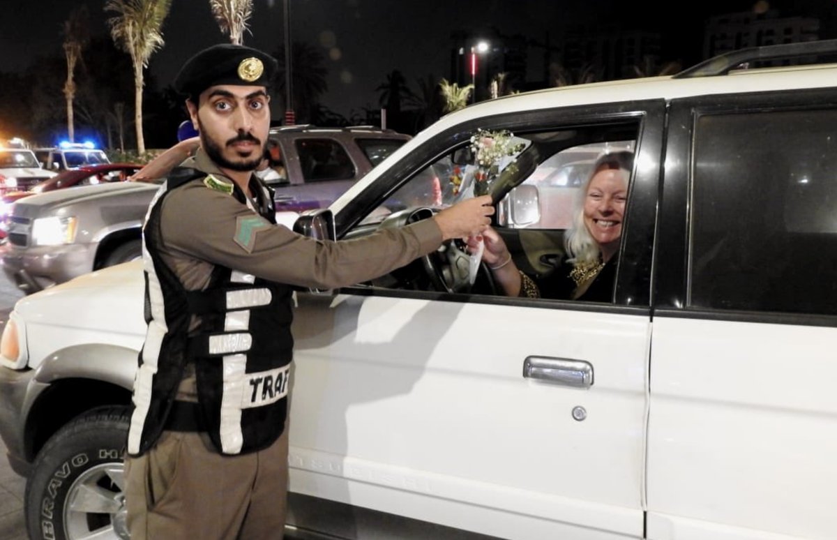 On the historic night of the lifting of the world’s only ban on female motorists, Saudi Arabian police officers handed out pink roses to women taking the wheel for the first time across the kingdom.