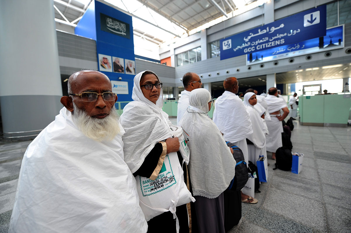 Muslim pilgrims go through passport control upon their arrival at Jeddah airpor, prior to the start of the annual Hajtj pilgrimage in the holy city of Makkah. (AMER HILABI/AFP/Getty Images)