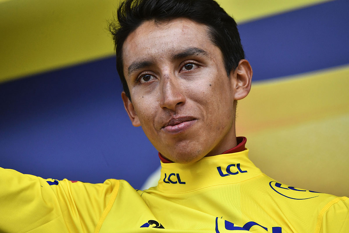 Colombia's Egan Bernal celebrates his overall leader's yellow jersey on the podium of the nineteenth stage of the 106th edition of the Tour de France cycling race between Saint-Jean-de-Maurienne and Tignes, in Tignes.