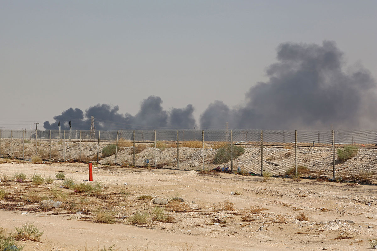 Smoke billows from an Aramco oil facility in Abqaiq about 60km (37 miles) southwest of Dhahran in Saudi Arabia's eastern province on September 14, 2019.