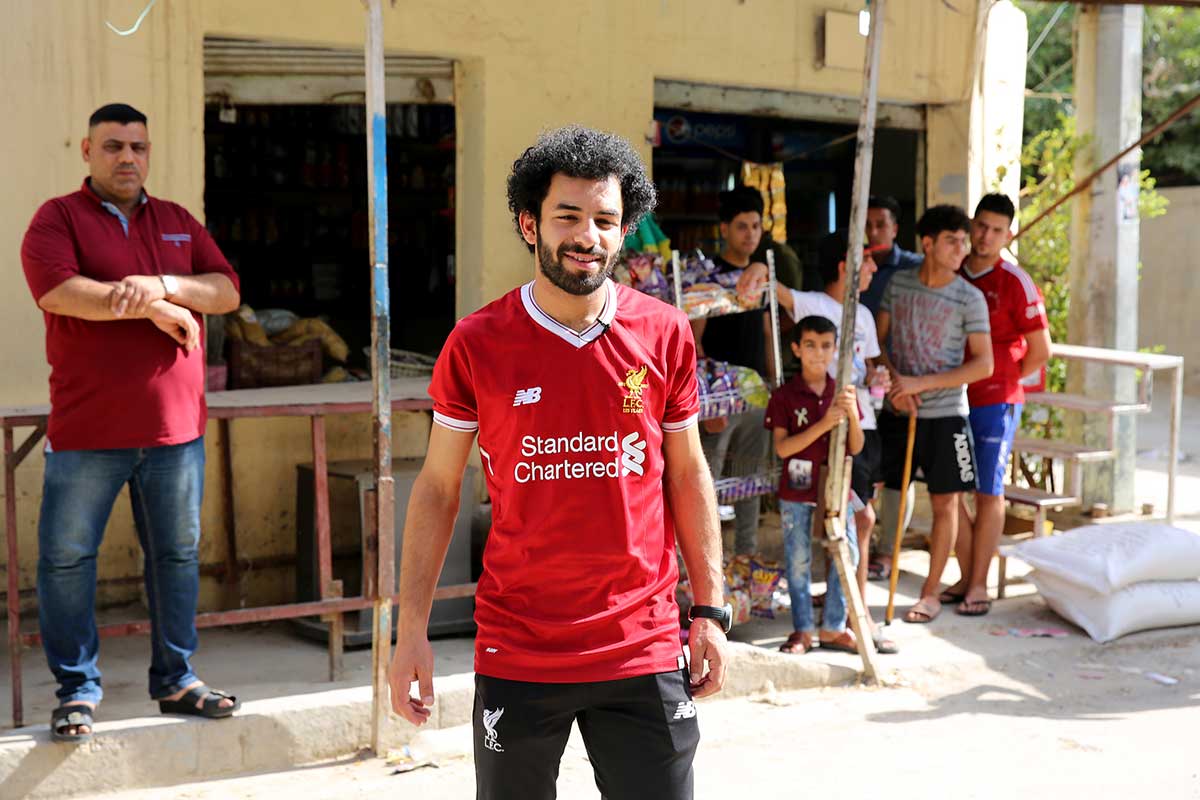 Iraqi footballer Hussein Ali, who plays for the Iraqi Al-Zawraa FC and is a lookalike of Liverpool's Egyptian forward Mohamed Salah, poses for pictures in the capital Baghdad.