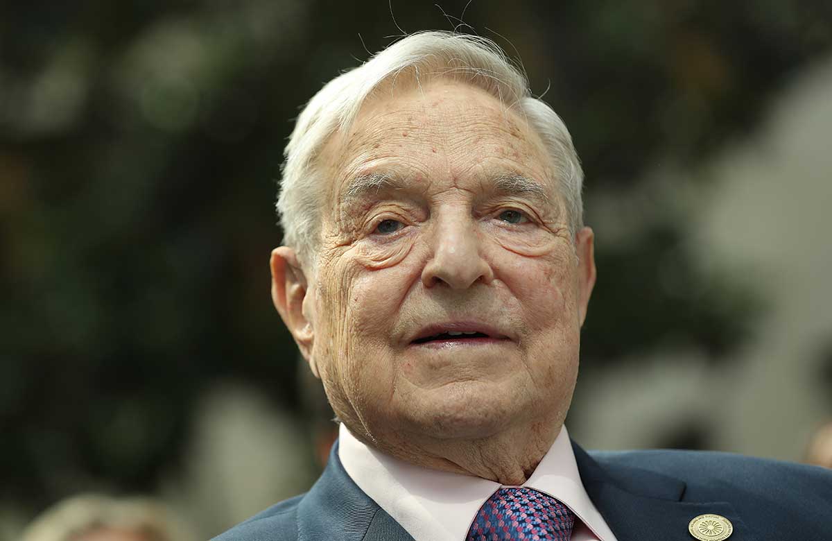 A surging dollar and a capital flight from emerging markets may lead to another “major” financial crisis, investor George Soros said, warning the European Union that it’s facing an imminent existential threat.