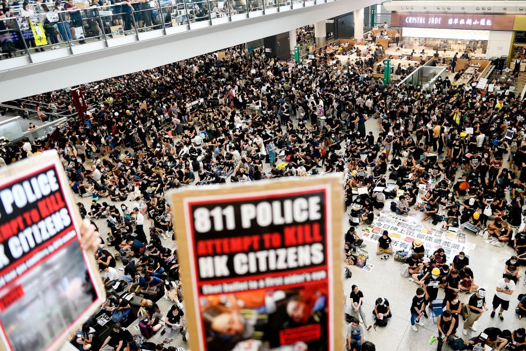 Pro-democracy protesters gather at Hong Kong's international airport. (MANAN VATSYAYANA/AFP/Getty Images)