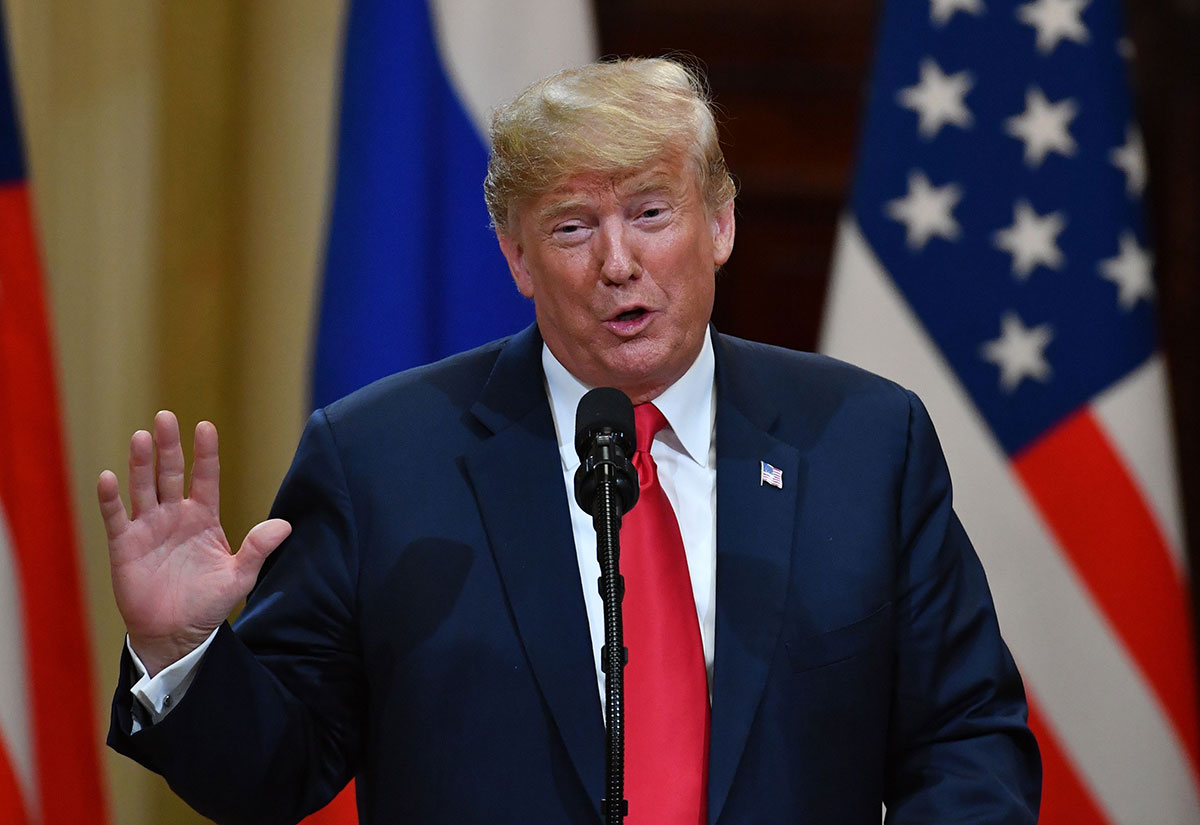 US President Donald Trump speaks during a joint press conference with Russia's President after a meeting at the Presidential Palace in Helsinki, on July 16, 2018.