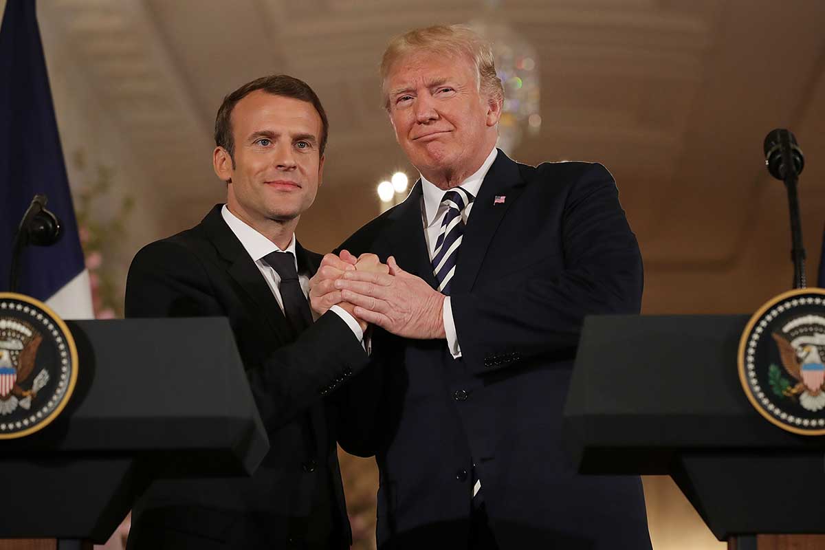 French President Emmanuel Macron (L) and U.S. President Donald Trump shake hands at the completion of a joint press conference in the East Room of the White House April 24, 2018 in Washington, DC.