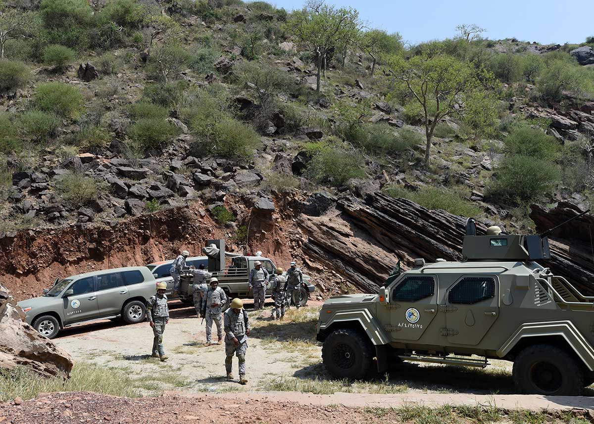 Saudi border guards keep watch along the border with Yemen in the al-Khubah area in the southern Jizan province.