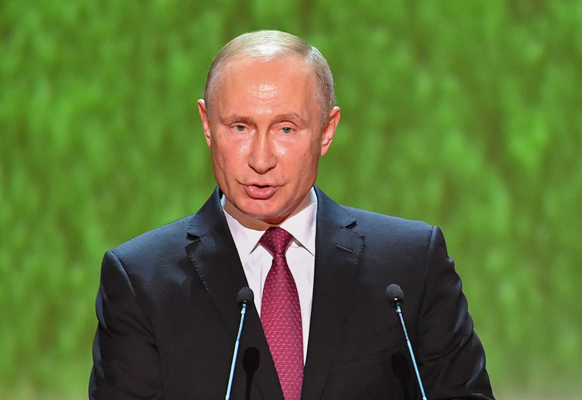 Russian President Vladimir Putin delivers a speech before a gala concert of world opera stars held at Bolshoi Theatre ahead of the 2018 FIFA World Cup Final match in Moscow on July 14, 2018.