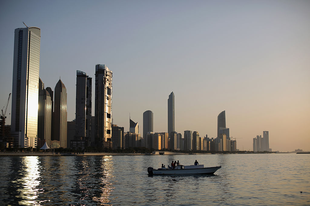 ABU DHABI UNITED ARAB EMIRATES  FEBRUARY 05  A general view of the city skyline at sunset from Dhow Harbour on February 5 2015 in Abu Dhabi United Arab Emirates Abu Dhabi is the capital of the United Arab Emirates and the second most populous city after Dubai with a population of around two million people  Photo by Dan KitwoodGetty Images