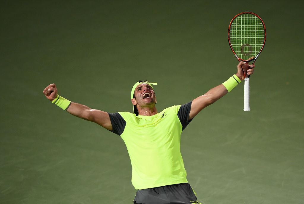 Malek Jaziri of Tunisia celebrates his win against Grigor Dimitrov of Bulgaria on day two of the ATP Dubai Duty Free Tennis Championships at the Dubai Duty Free Stadium.
Photo: Tom Dulat/Getty Images