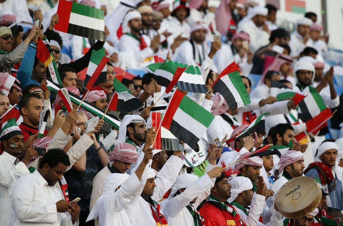 Emirati fans cheer for their team prior to the start of the Gulf Cup of Nations Group B football match between United Arab Emirates and Oman at the Prince Faisal bin Fahd stadium in Riyadh. (AFP/Getty Images)