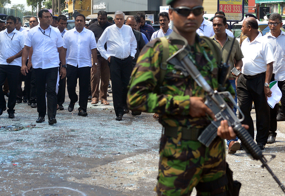 Sri Lankan Prime Minister Ranil Wickremasinghe arrives to visit the site of a bomb attack at St Anthony's Shrine in Kochchikade in Colombo. (ISHARA S KODIKARA/AFP/Getty Images)