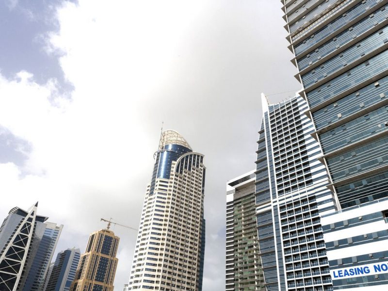 A sign advertises offices to lease at Jumeirah Lakes Towers in Dubai