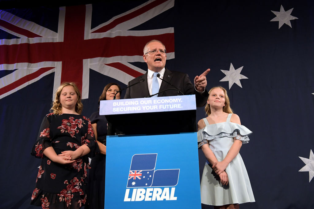 Prime Minister of Australia and leader of the Liberal Party Scott Morrison flanked by his wife Jenny Morrison and daughters Lily Morrison and Abbey Morrison delivers his victory speech