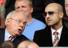 IN TALKS: Prince Faisal bin Fahd bin Abdullah Al Saud, right, pictured at the Liverpool v Hull match on Saturday. (Getty Images)