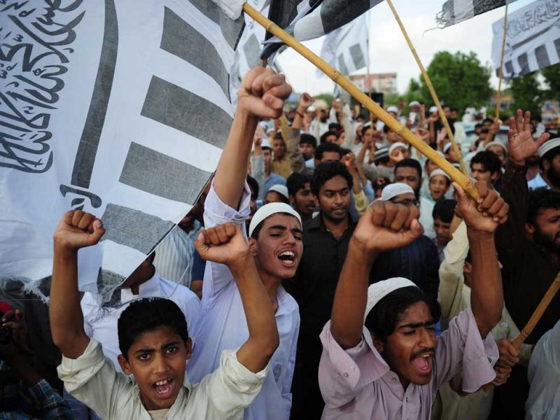 Activists of Pakistani Jamaat-ud-Dawa chant slogans during Muslim funeral prayers for Osama bin Laden on a street in Karachi on May 3, 2011. (AFP/Getty Images)