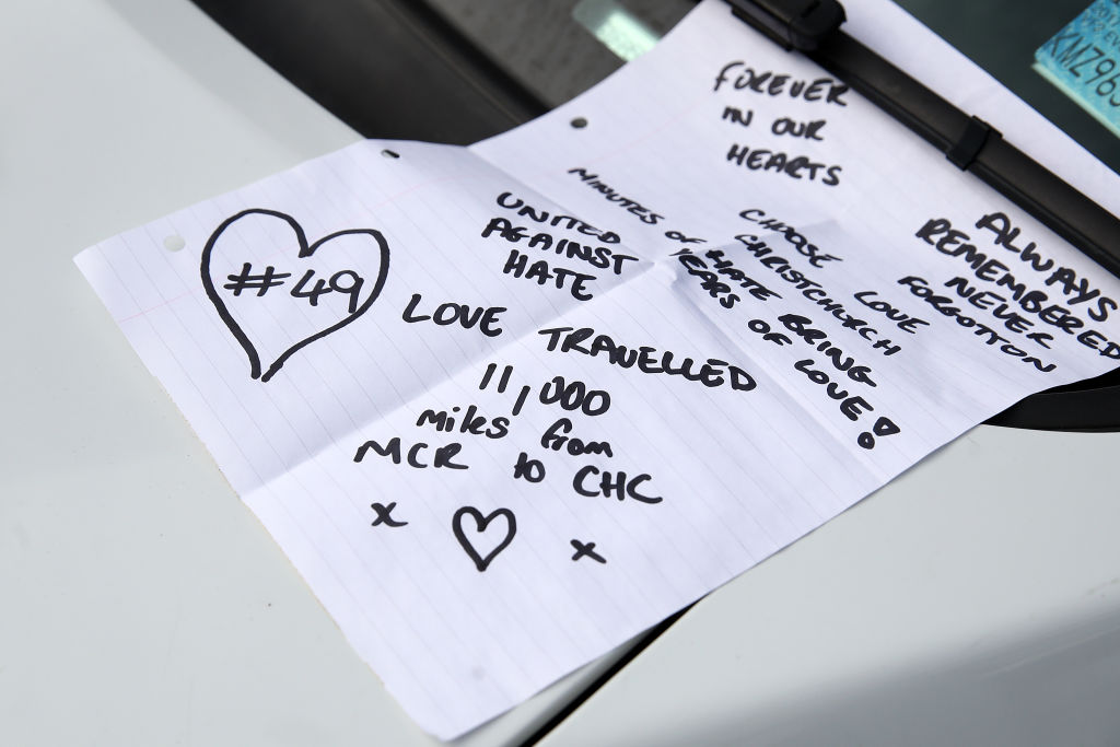 A note is left on a police car windscreen on Deans Avenue near the Al Noor Mosque on March 16 in Christchurch, New Zealand. (Fiona Goodall/Getty Images)