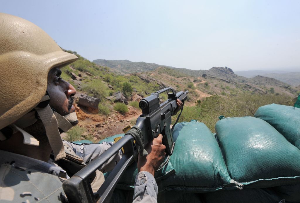 Saudi border guards keep watch along the border with Yemen in the alKhubah area in the southern Jizan province