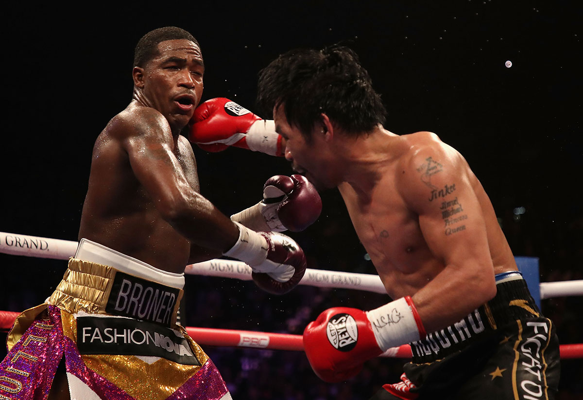 LAS VEGAS, NEVADA - JANUARY 19: Manny Pacquiao (R) throws a right on Adrien Broner during the WBA welterweight championship at MGM Grand Garden Arena on January 19, 2019 in Las Vegas, Nevada. (Photo by Christian Petersen/Getty Images)