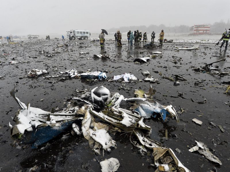 Russian emergency rescuers and forensic investigators work on the wreckage of the flydubai passenger jet which crashed, killing all 62 people on board as it tried to land in bad weather in the city of Rostov-on-Don. (Getty Images)