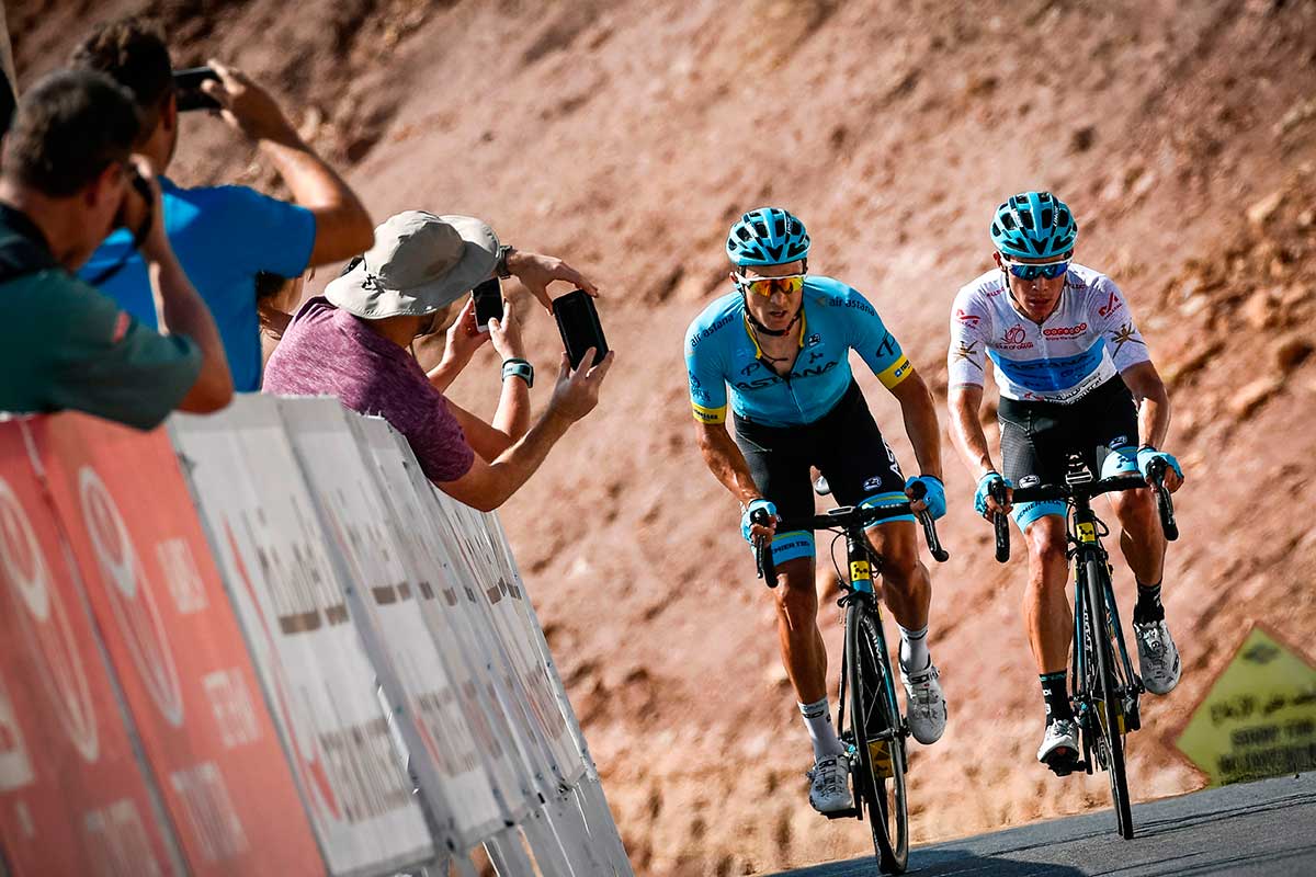 UCI Colombian rider Miguel Angel Lopez of Astana Pro Team (R) followed by his Kazakh teammate Alexey Lutsenko crosses the finish line to win the fifth stage of the cycling Tour of Oman between Sama'il and Jabal al-Akhdhar (Green Mountain) in Sayq on February 17, 2018.