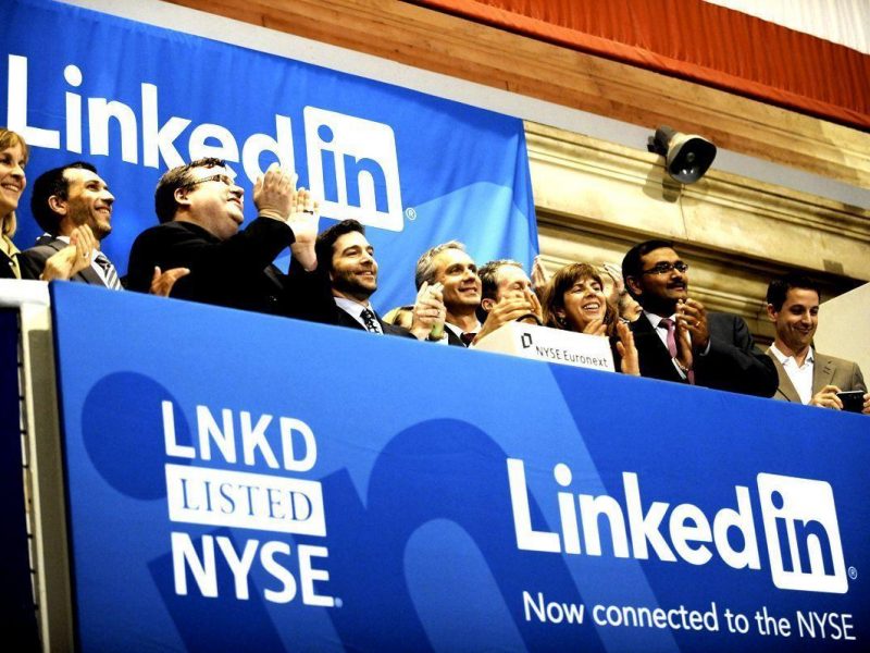 LinkedIn founder Reid Garrett Hoffman (Center with beard) and CEO Jeff Weiner (2nd R) at the ringing of the opening bell of the New York Stock Exchange May 19, 2011 during the initial public offering of the company (Getty Images)