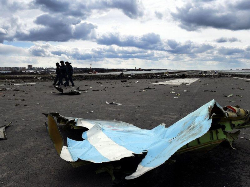 Russian Emergency Ministry rescuers examine the wreckage of a crashed airplane at the Rostov-on-Don airport on March 20, 2016. (VASILY MAXIMOV/AFP/Getty Images)