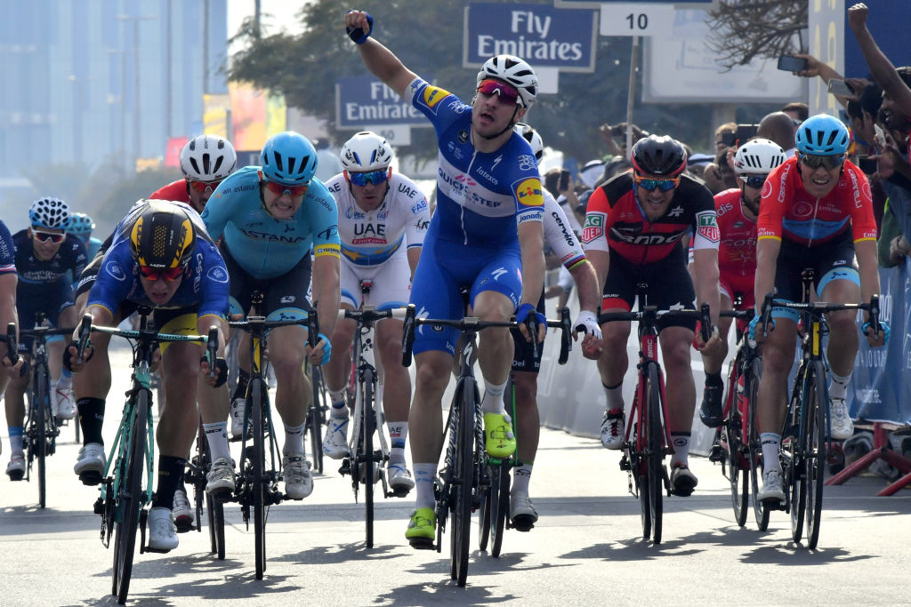 QuickStep Floors rider Elia Viviani of Italy celebrates after crossing the finish line of the second stage of the Dubai Tour from Sky Dive Dubai to Ras Lkhaimah on February 7 2018   
 Photo: GIUSEPPE CACACE/AFP/Getty Images.