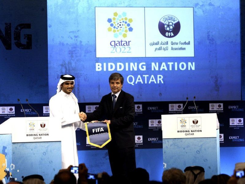 Qatar 2022 Bid chairman Sheikh Mohammed bin Khalifa Al Thani receives the FIFA insignia from chief FIFA inspector Harold Mayne-Nicholls. (Getty Images)