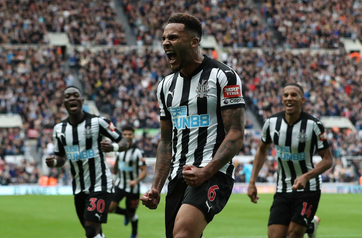 Jamaal Lascelles of Newcastle United celebrates after he scores the winning goal during the Premier League match between Newcastle United and Stoke City. (Getty Images)