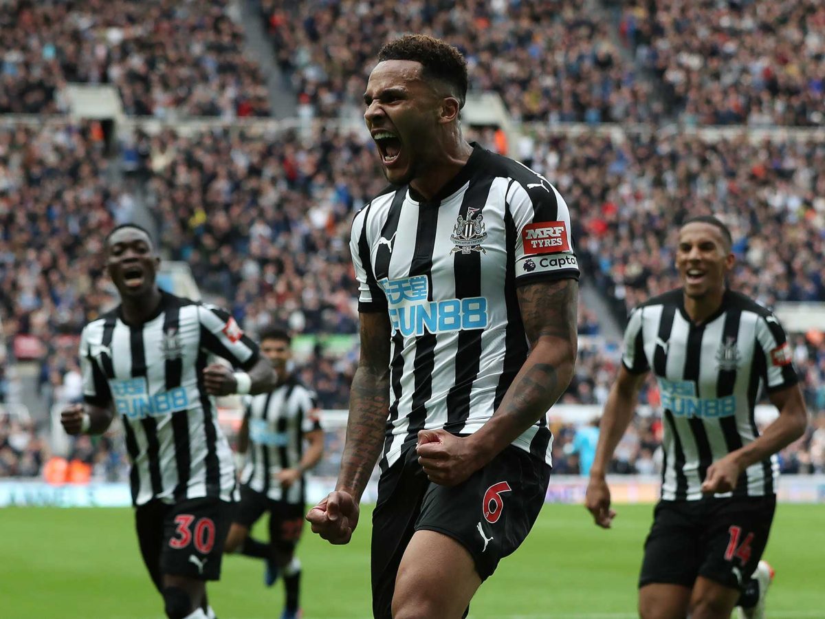 Jamaal Lascelles of Newcastle United celebrates after he scores the winning goal during the Premier League match between Newcastle United and Stoke City. (Getty Images)