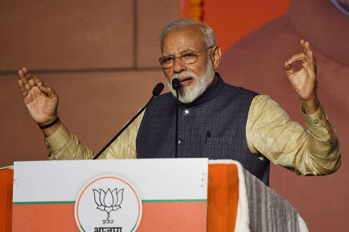 India Prime Minister Narendra Modi gestures as he speaks on stage during his victory speech at the Bharatiya Janta Party (BJP) headquarters after winning India's general election, in New Delhi on May 23, 2019.