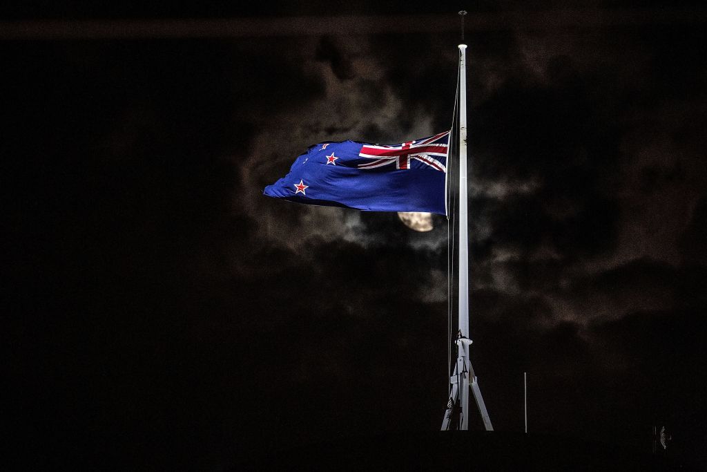 TOPSHOT  The New Zealand national flag is flown at halfmast on a Parliament building in Wellington after a shooting incident in Christchurch. (MARTY MELVILLE/AFP/Getty Images)