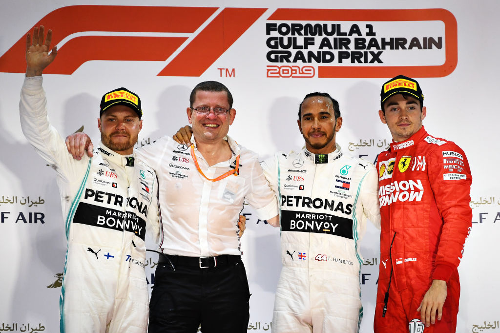 Charles Leclerc on the podium after the F1 Grand Prix of Bahrain with Lewis Hamilton and Valtteri Bottas. (Clive Mason/Getty Images)