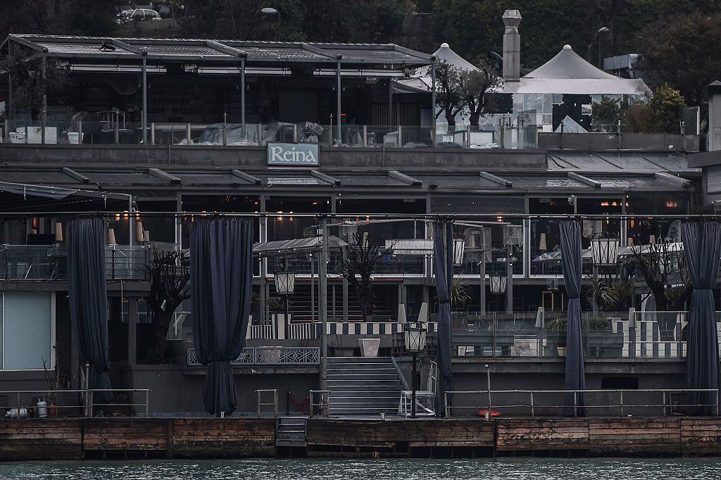 Forensic officers (unseen) work inside the Reina night club, one of the Istanbuls most exclusive party spots, early on January 1, 2017 after at least one gunmen went on a shooting rampage during New Years Eve celebrations. Thirty-nine people, including many foreigners, were killed when a gunman reportedly dressed as Santa Claus stormed an