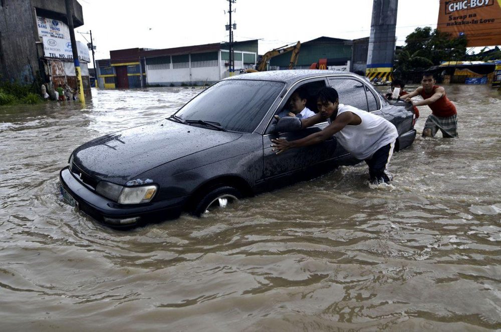 Tropical storms hit Manila - Arabian Business