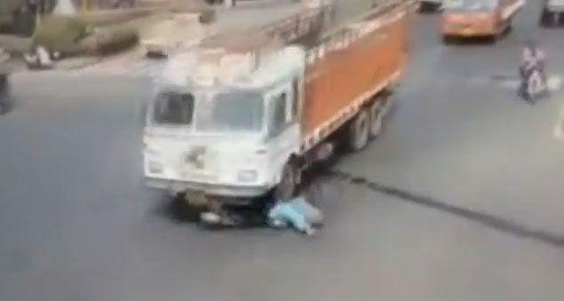 Trucks runs over woman on scooter in India - Arabian Business: Latest ...