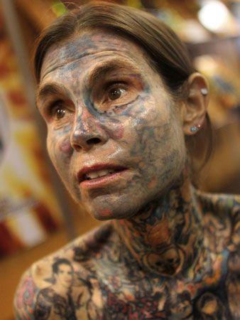 Aggregate more than 70 most tattooed woman in world  thtantai2