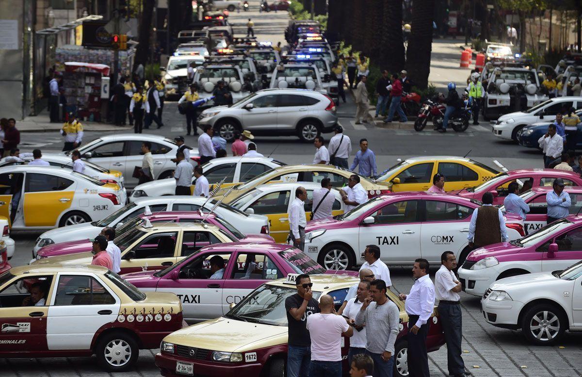 In pictures: Taxi drivers stage protests against Uber in Mexico 