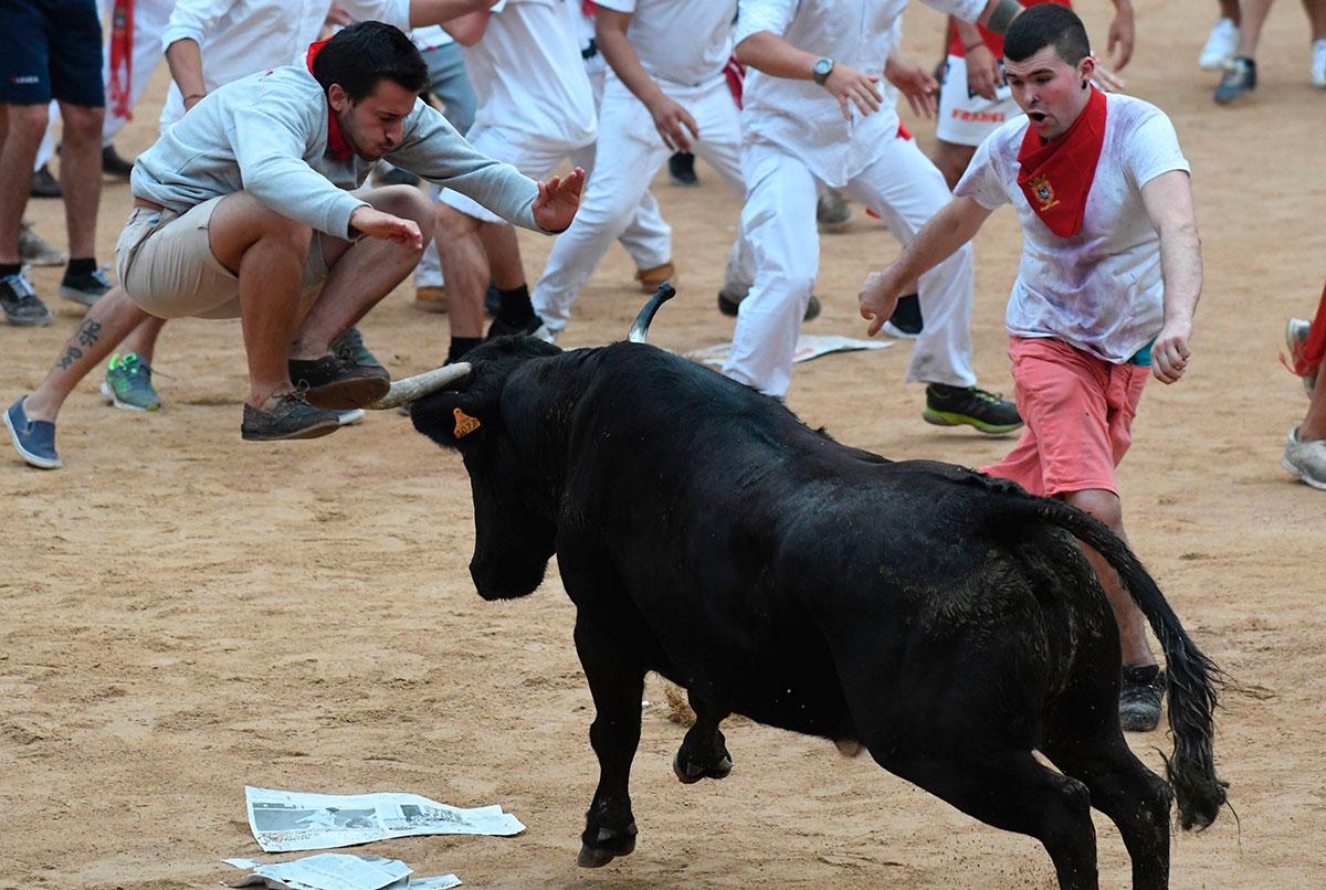 In pictures: Bull running festival in Spain - Arabian Business: Latest ...