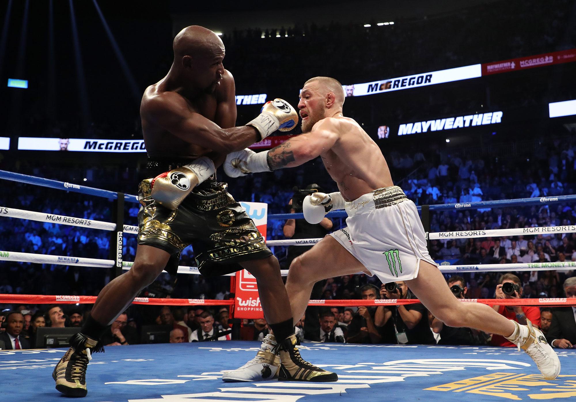 In pictures: Floyd Mayweather stopped UFC champion Conor McGregor in ...