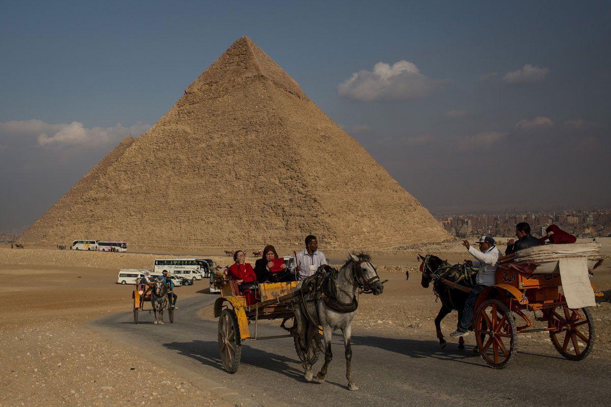 In pictures: Tourists visit Egypt's famous Giza Pyramids after recent ...