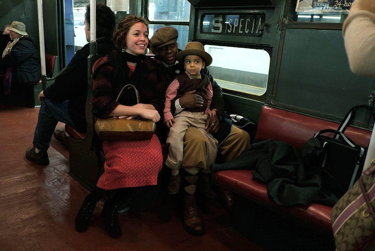 Riders enjoy vintage New York City subway trains in annual holiday