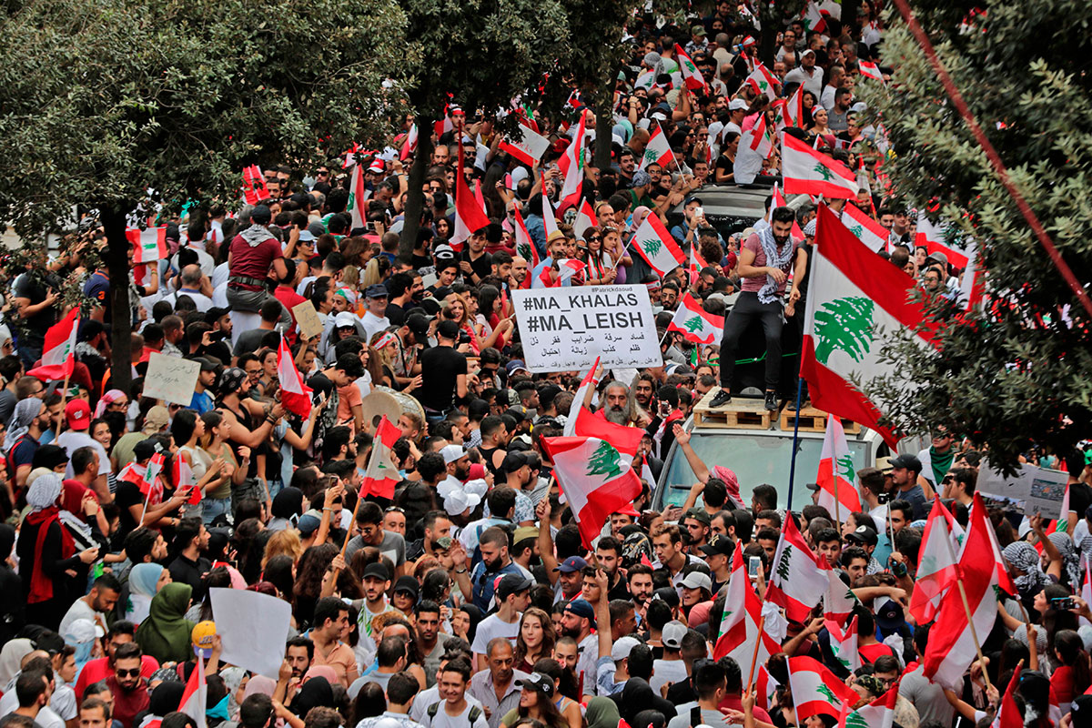 Hundreds of thousands take over streets as Lebanon's protests grow